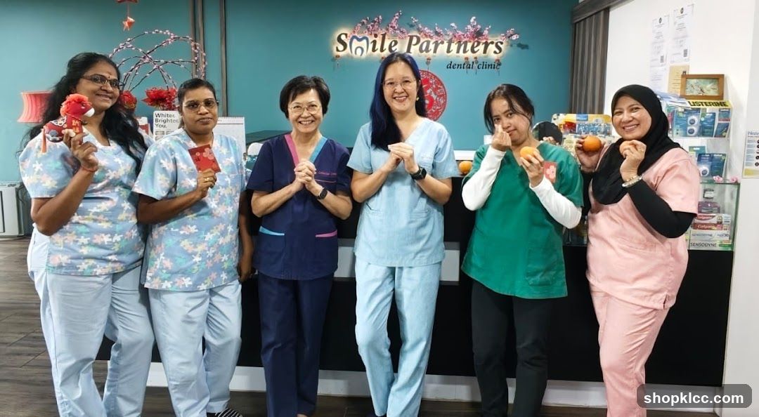 Smile Partners Dental Clinic Staff with Fruits