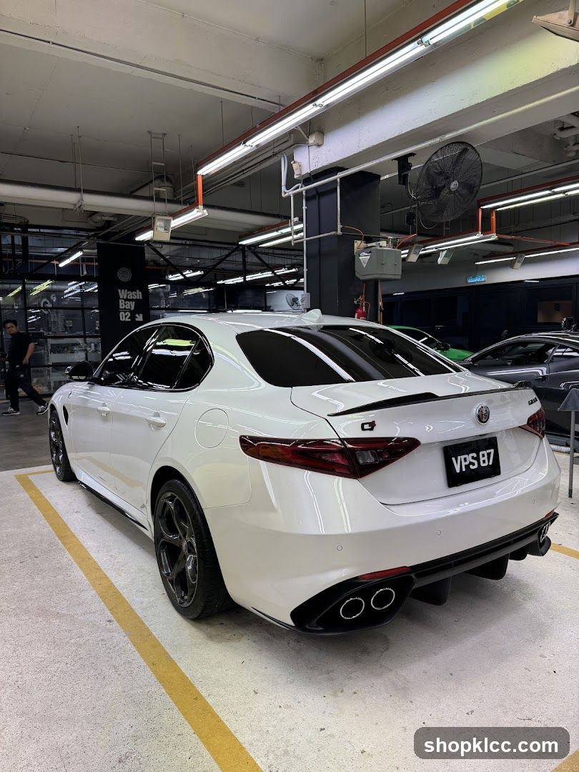 White Maserati Ghibli in Garage