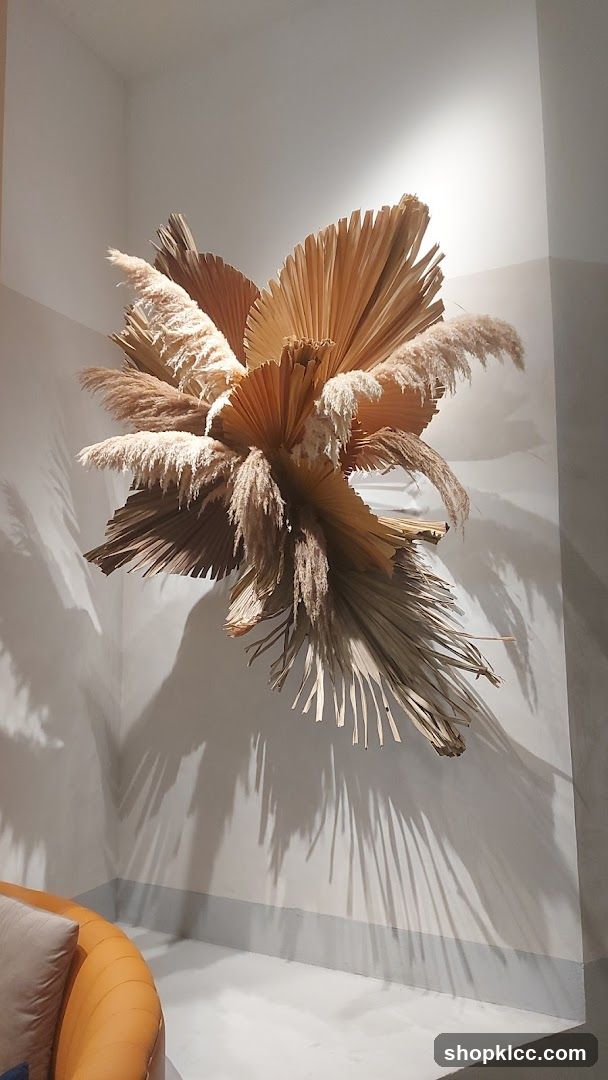 Wall-mounted dried plant sculpture