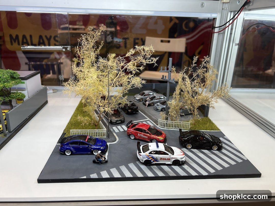 Diorama of a street scene with toy cars