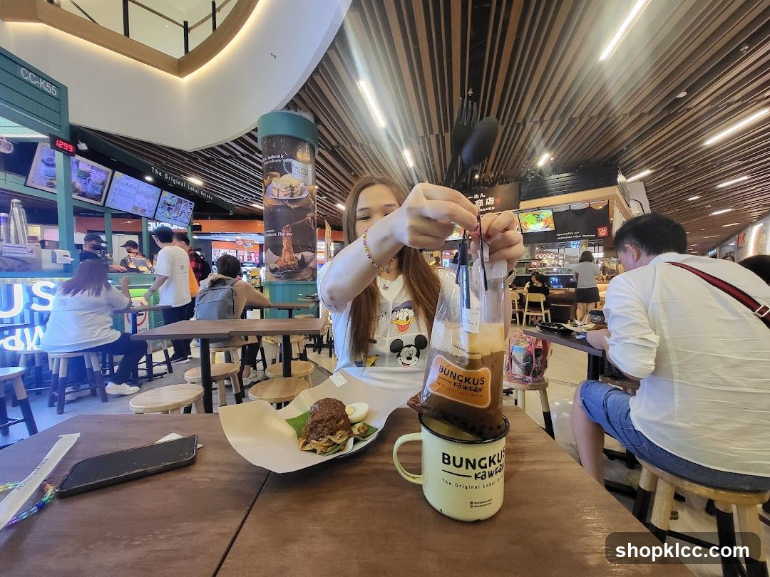 People eating at a food court