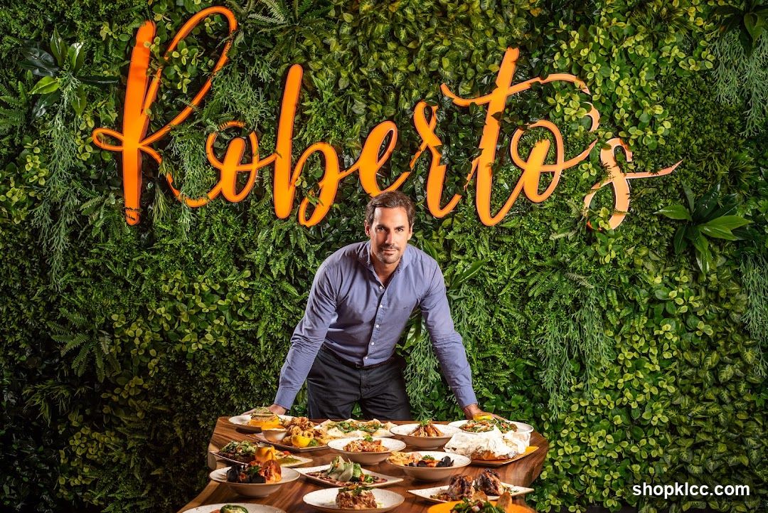 Man with a spread of food