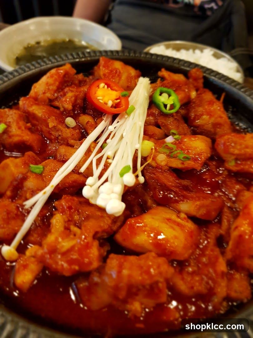 Spicy Braised Chicken with Enoki Mushrooms