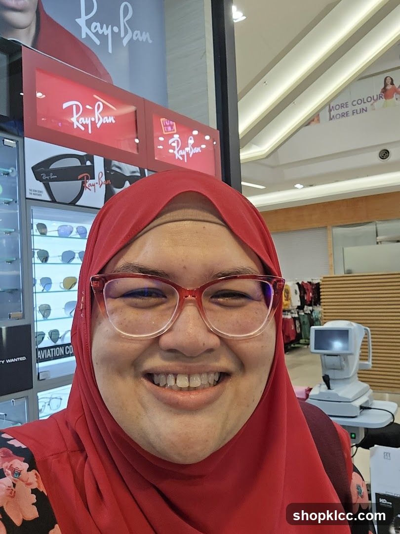 Woman in Red Hijab and Glasses