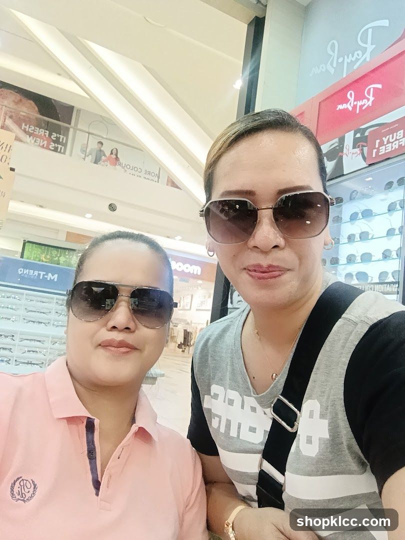 Two Women Wearing Sunglasses