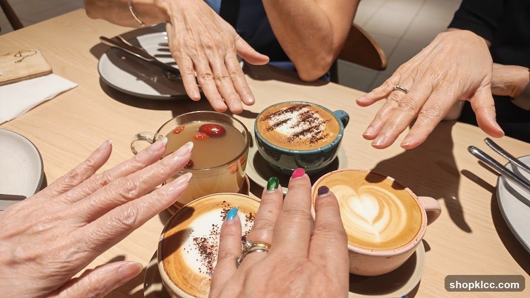 Hands reaching for coffee and tea