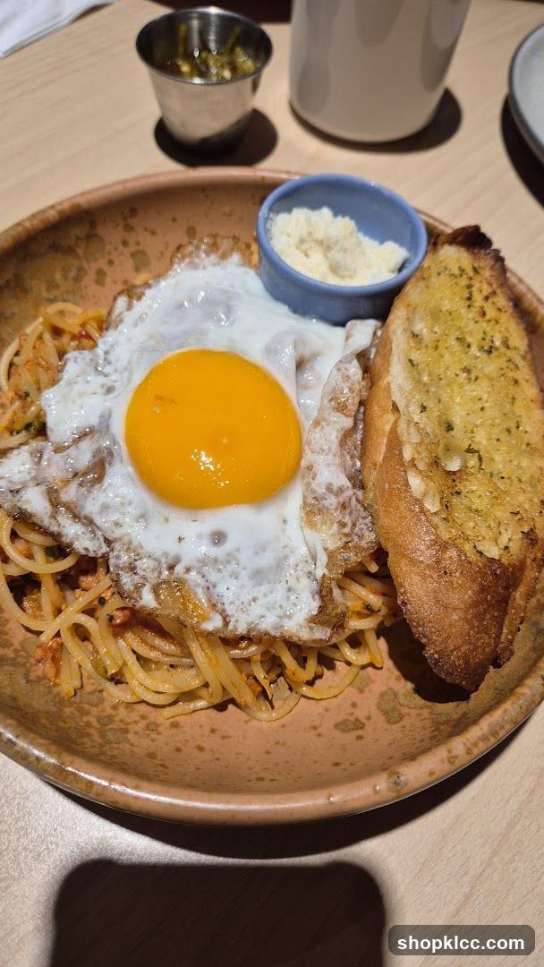 Spaghetti with Fried Egg and Garlic Bread