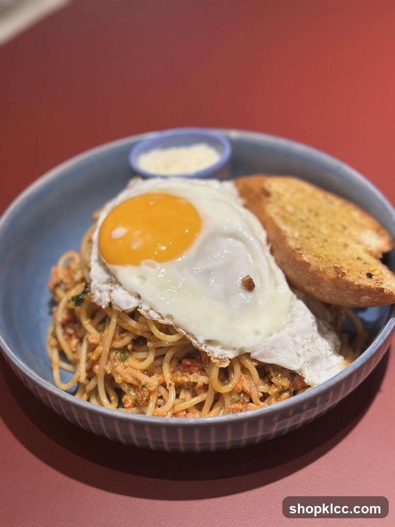 Spaghetti with Fried Egg and Garlic Bread