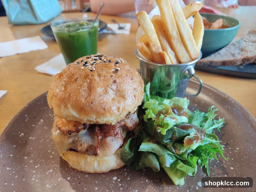 Burger with fries and salad