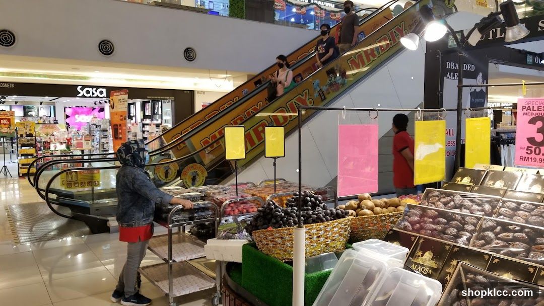 Mall Interior with Escalator and Fruit Stand
