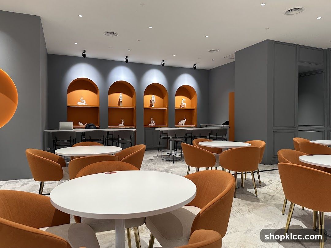 Modern Cafe Interior with Orange Seating