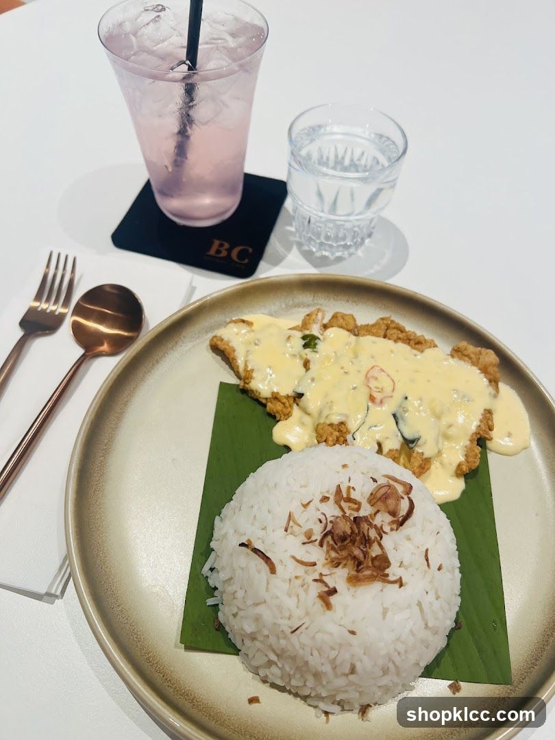 Chicken dish with rice and drink