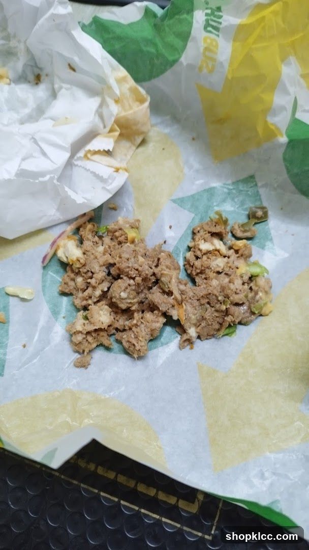 Subway wrapper with food remnants