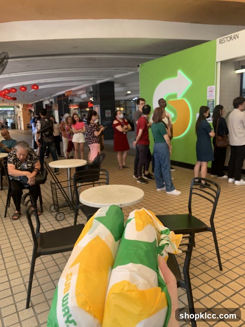 People in Line at Subway