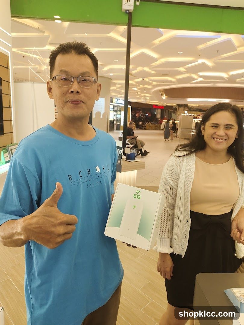 Man and Woman with 5G Device