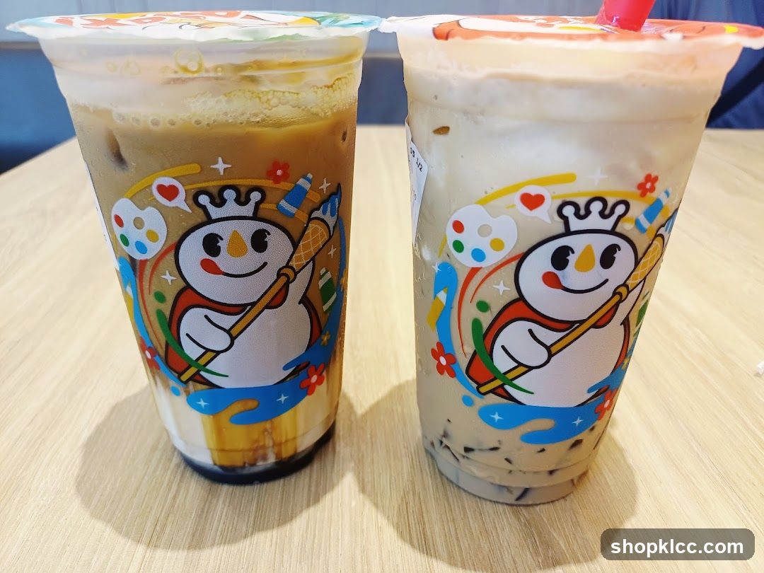 Two iced drinks with cartoon snowman logo
