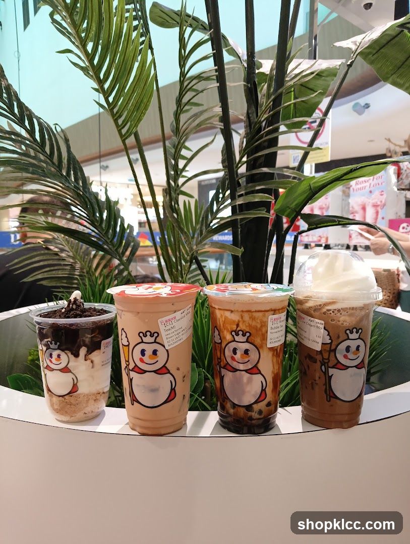 Four Drinks with Snowman Logo