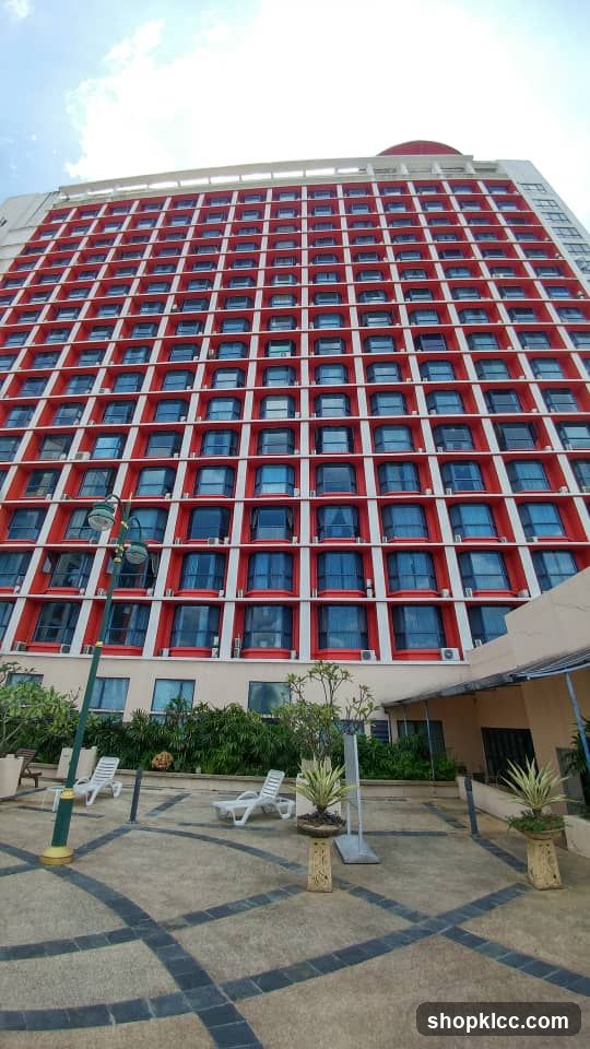 Tall building with red and white facade