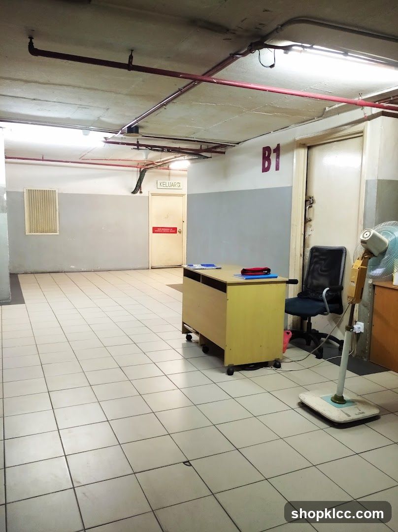Office hallway with desk and fan