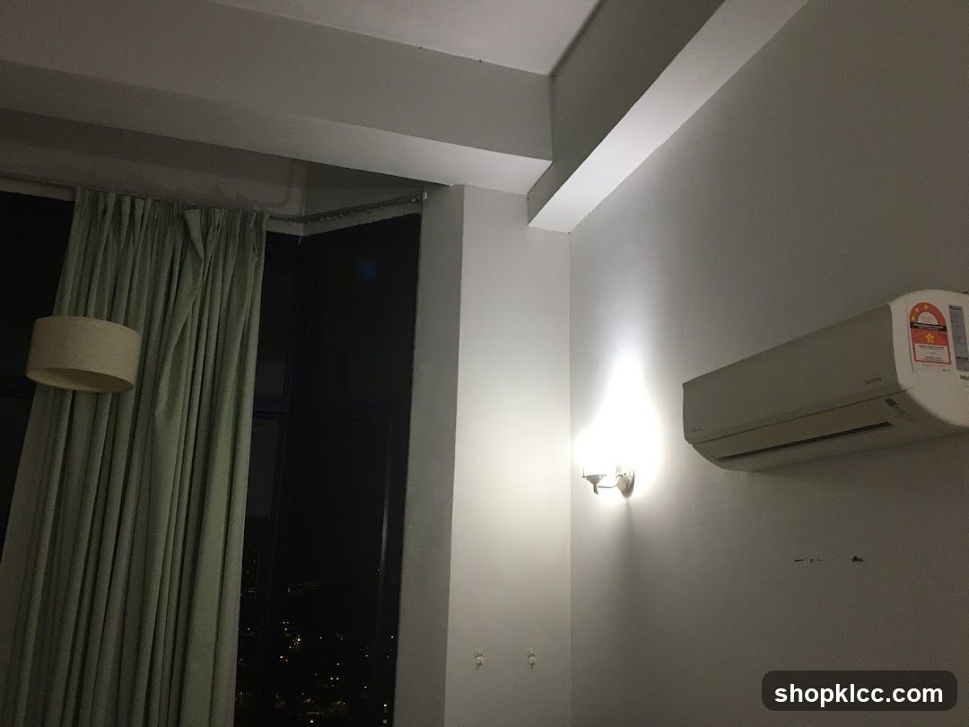 Interior of a room with a window and air conditioner