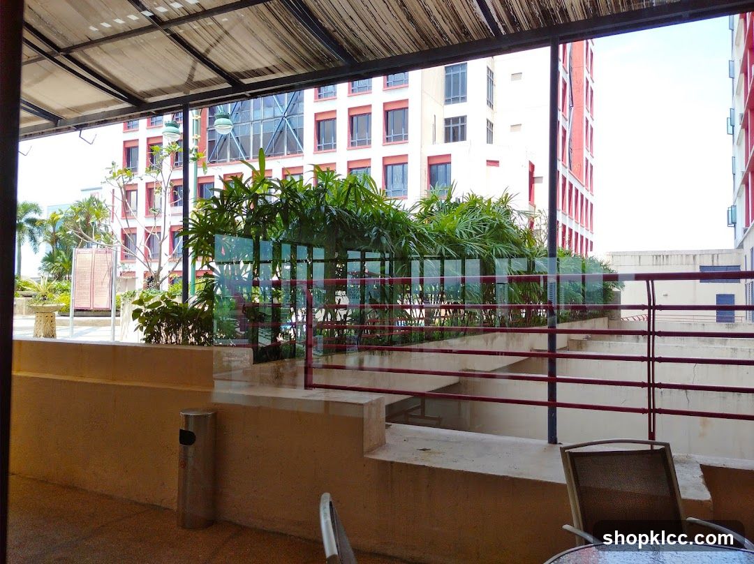 Outdoor seating area with buildings in the background