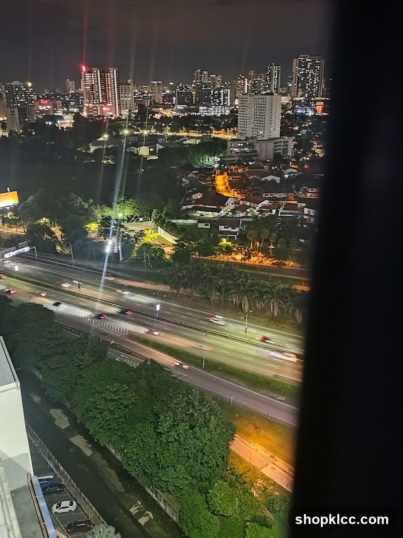 Cityscape at Night with Highway