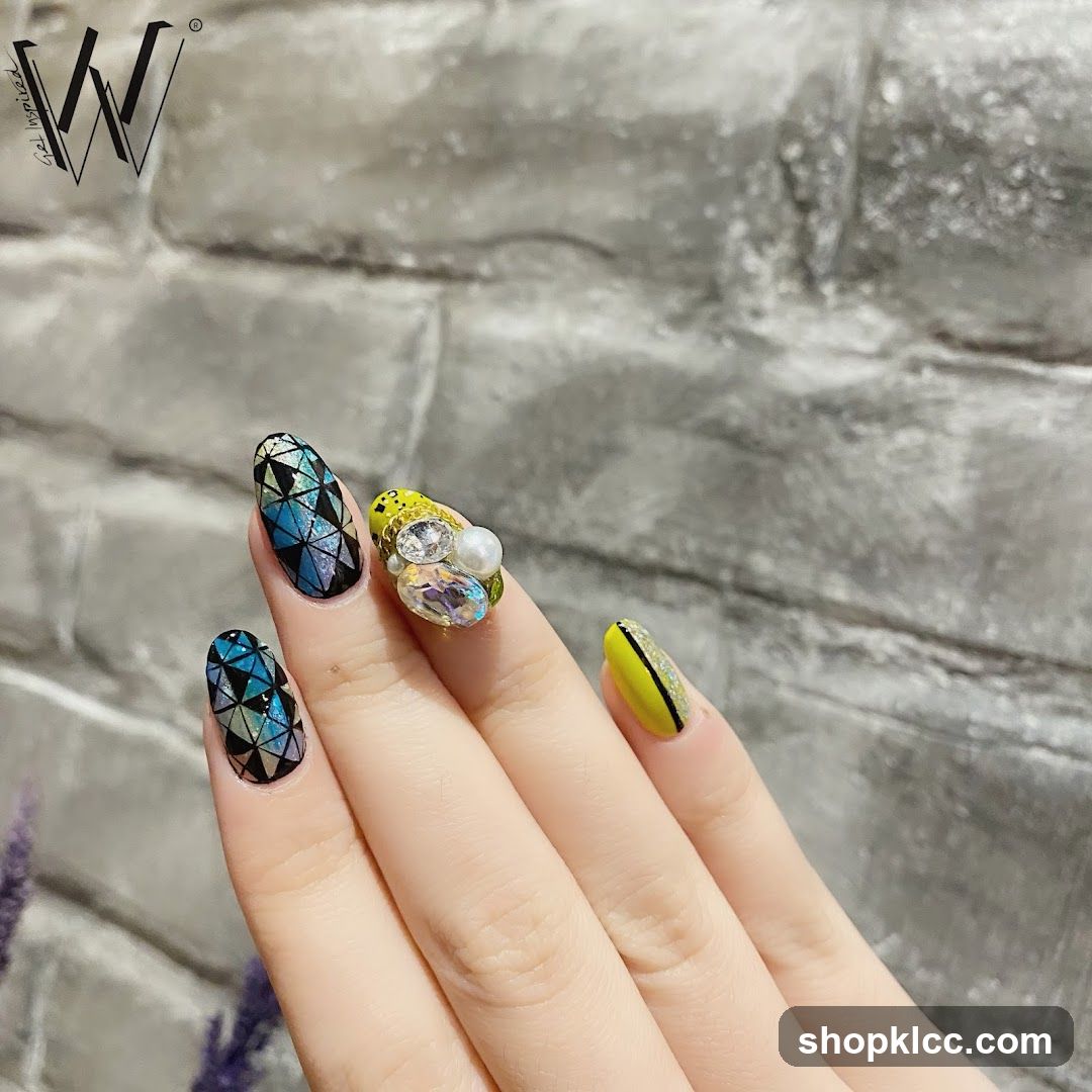 Nail Art with Rhinestones and Geometric Design