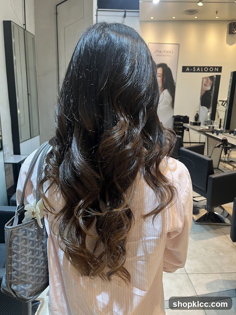 Woman with styled hair in a salon