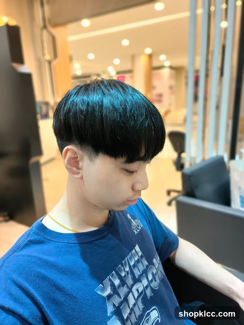 Man with a bowl cut