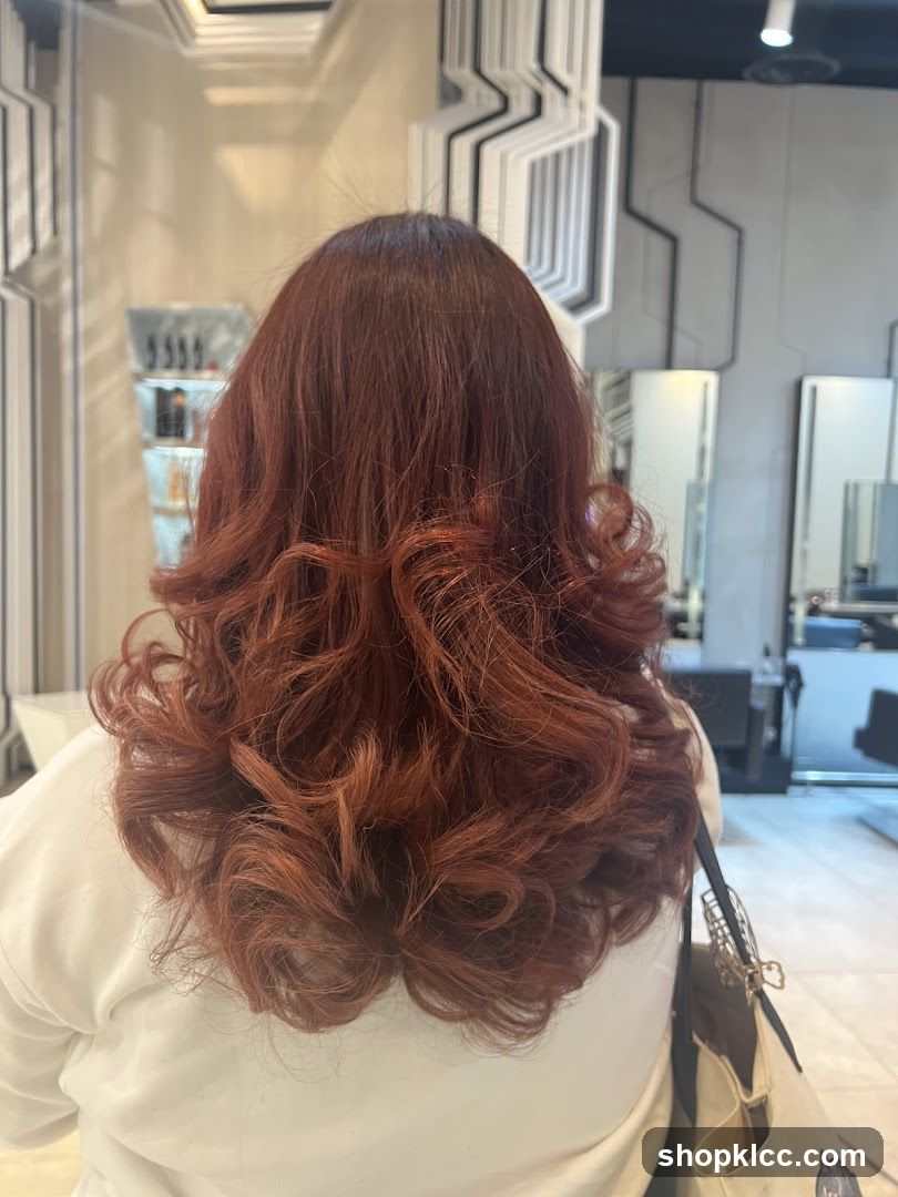 Woman with styled auburn hair