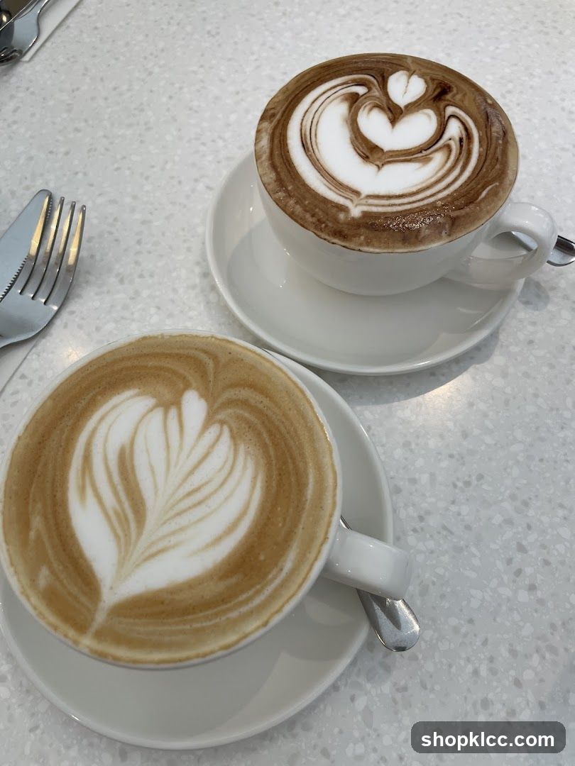 Two coffees with latte art