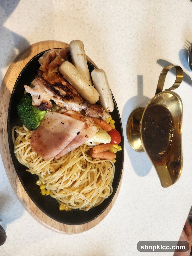 Sizzling Platter with Spaghetti and Grilled Chicken