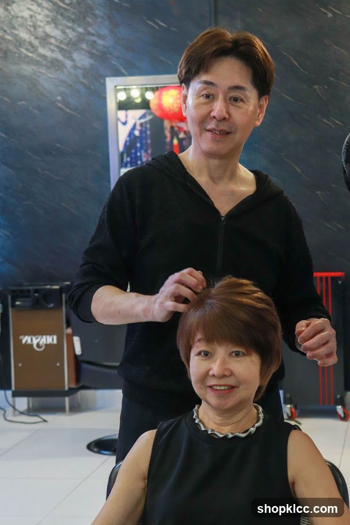 Hairdresser styling a client's hair