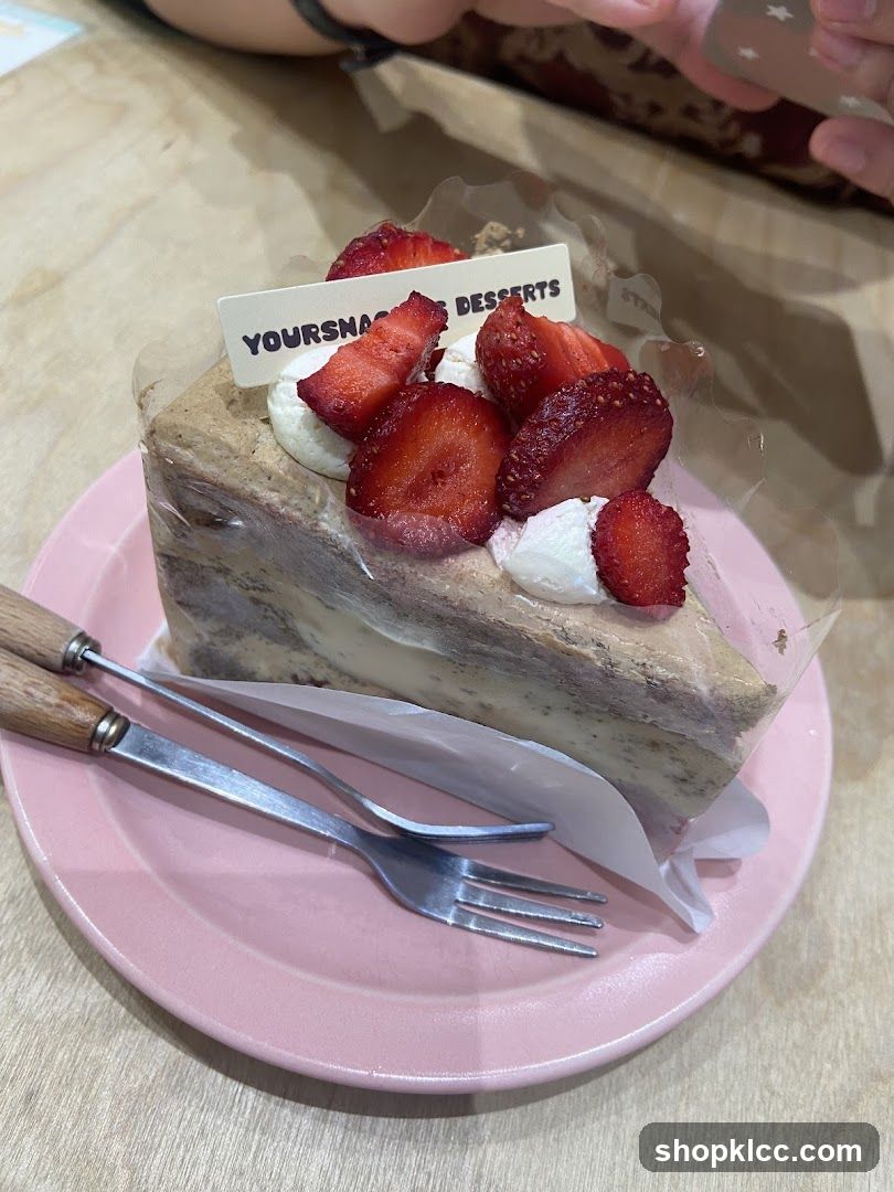 Slice of cake with strawberries