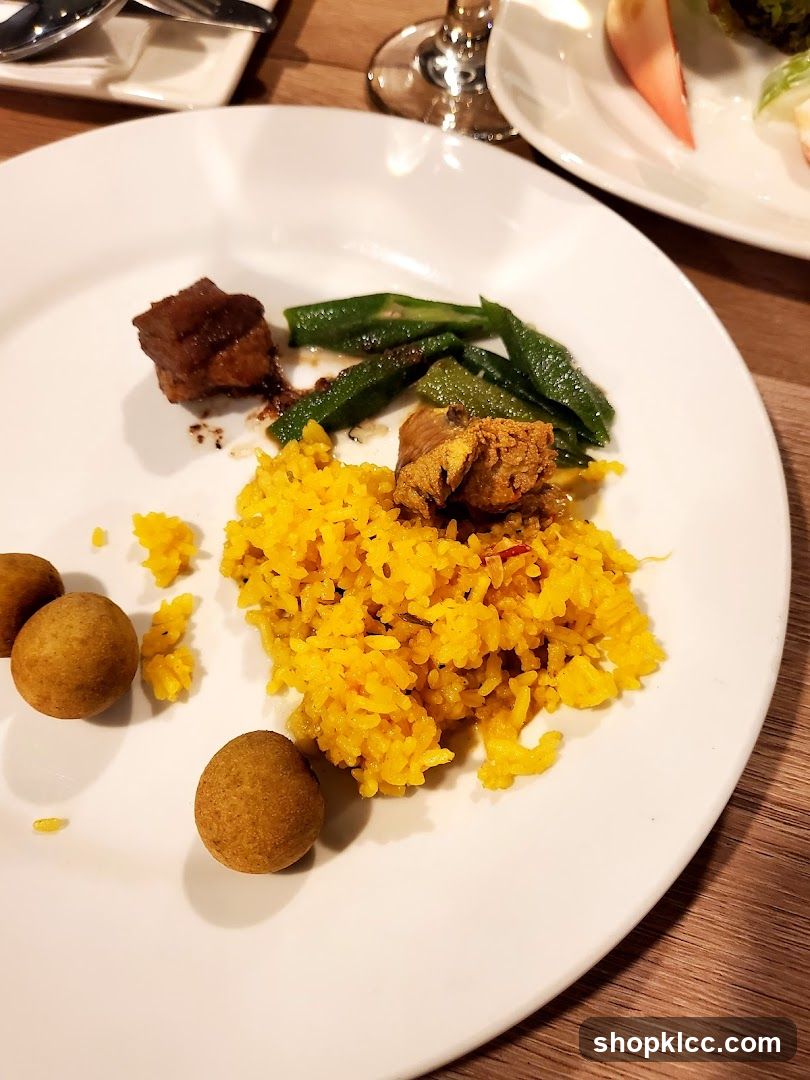 Plate of food with rice and meat
