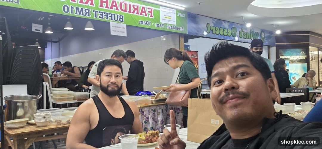 People eating at a buffet