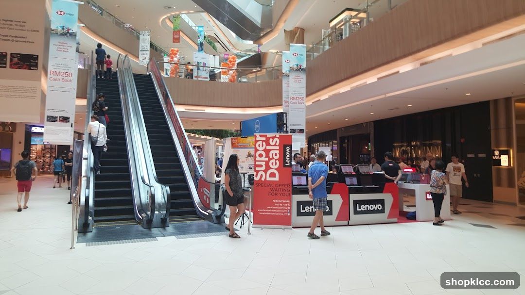 Mall Interior with Escalators and Lenovo Promotion