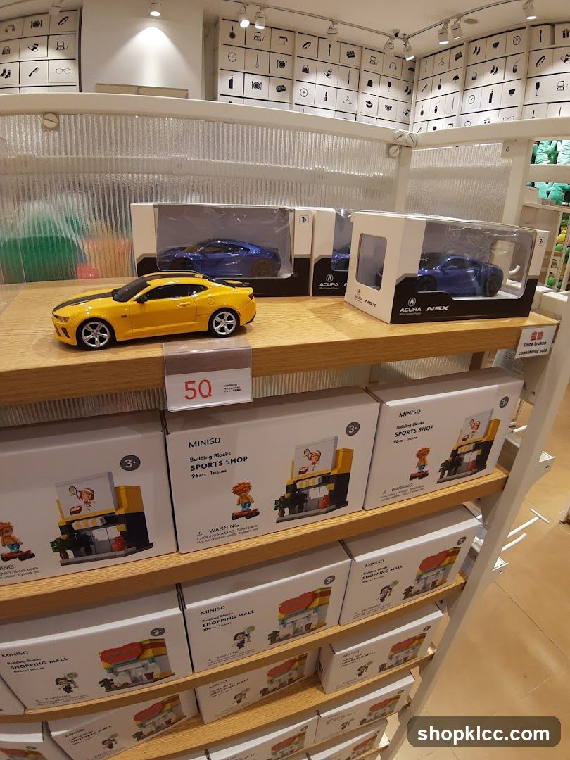 Toy cars and building block sets on display