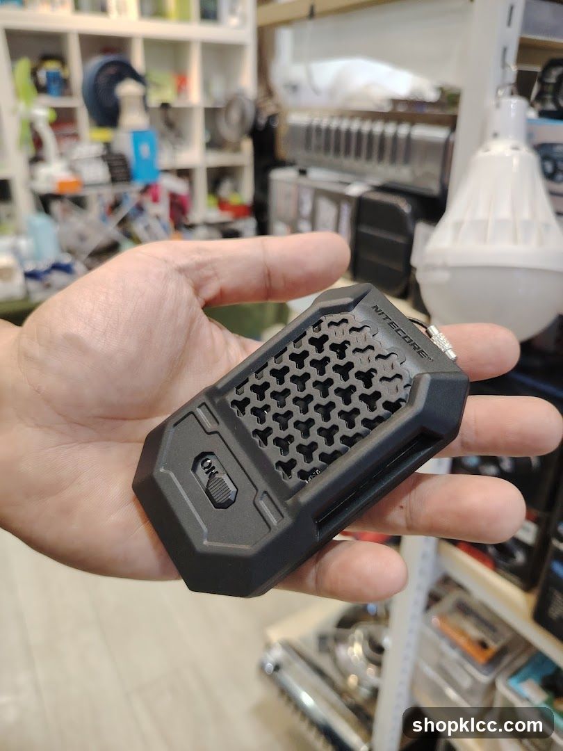 Nitecore device held in hand