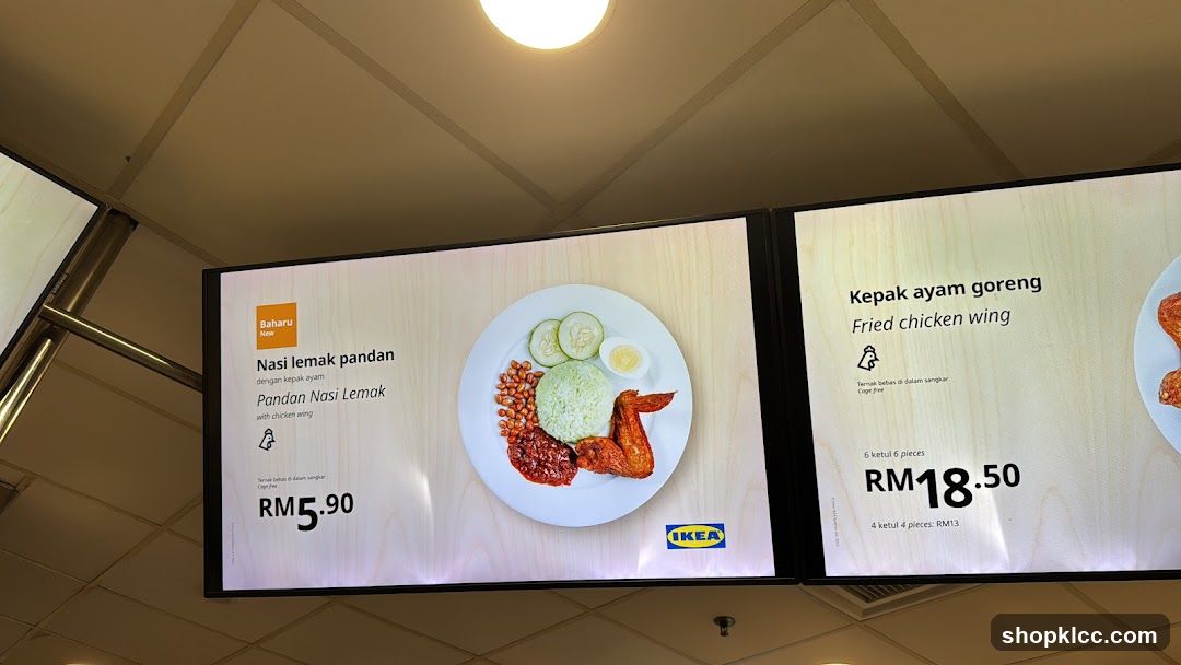 Digital menu boards displaying food items and prices.