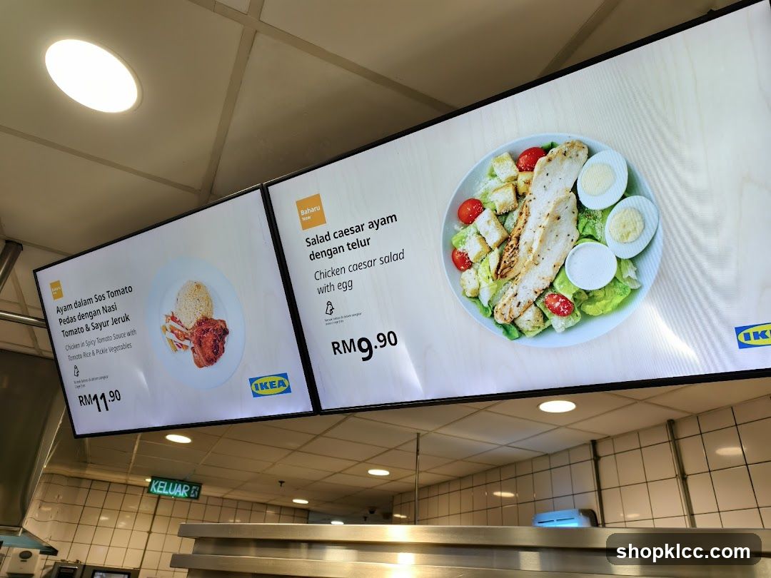 Digital menu boards displaying food items and prices.