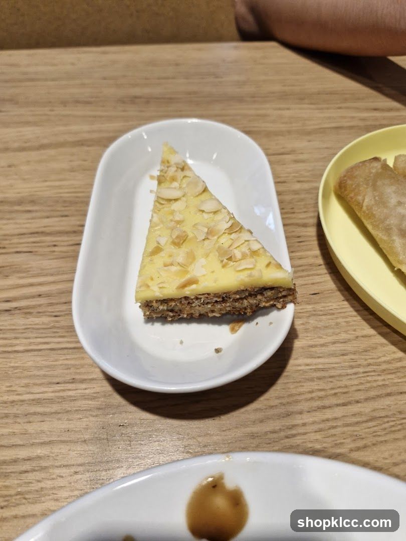 Slice of cake with almonds