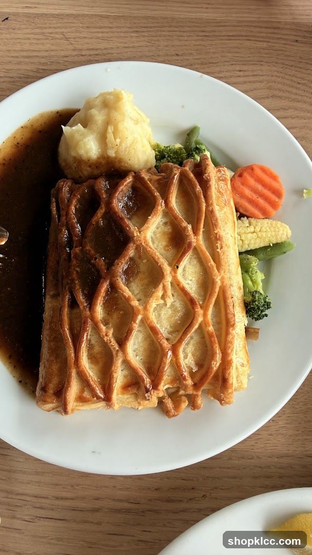 Beef Wellington with Mashed Potatoes and Vegetables