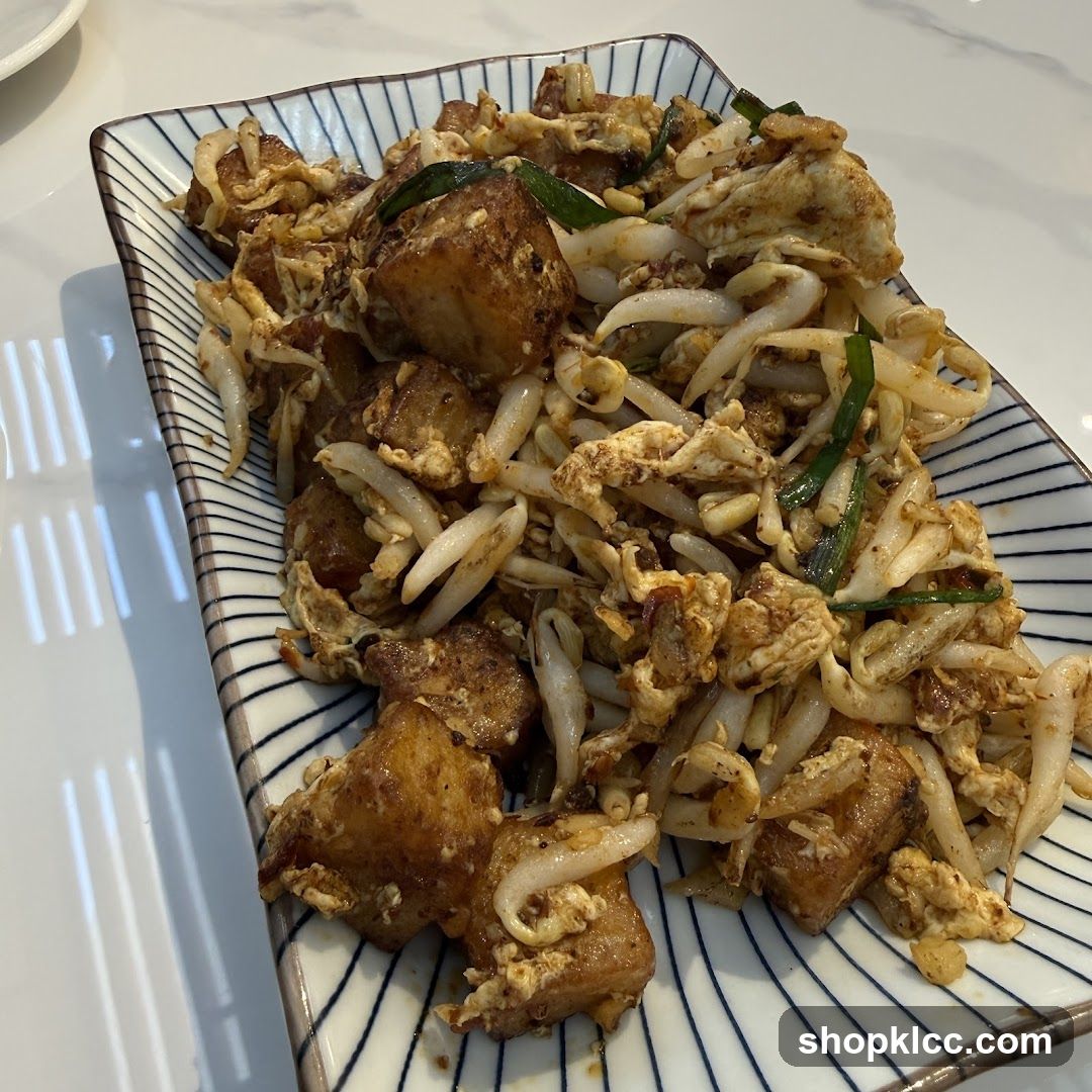 Fried Turnip Cake with Bean Sprouts and Egg