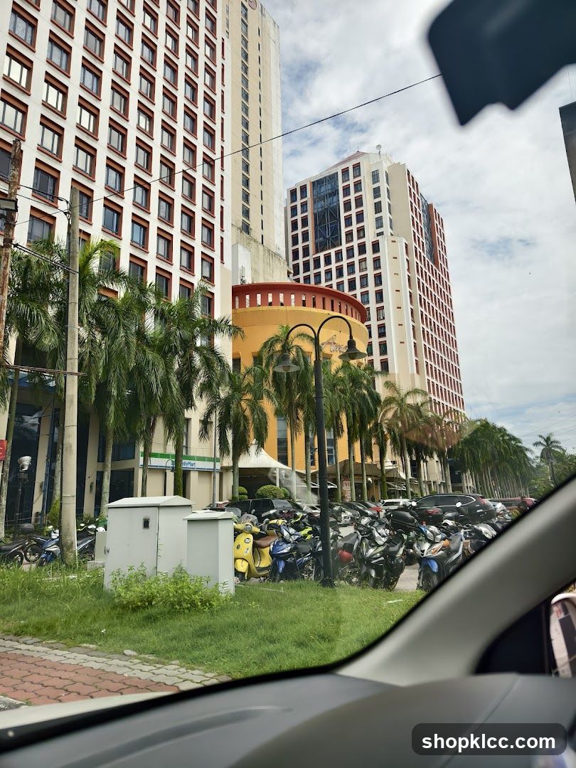City Street with Tall Buildings and Parked Scooters