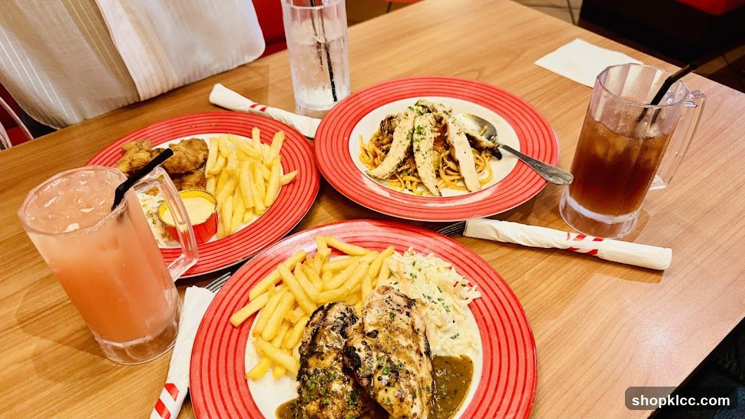 Three meals with drinks on a table