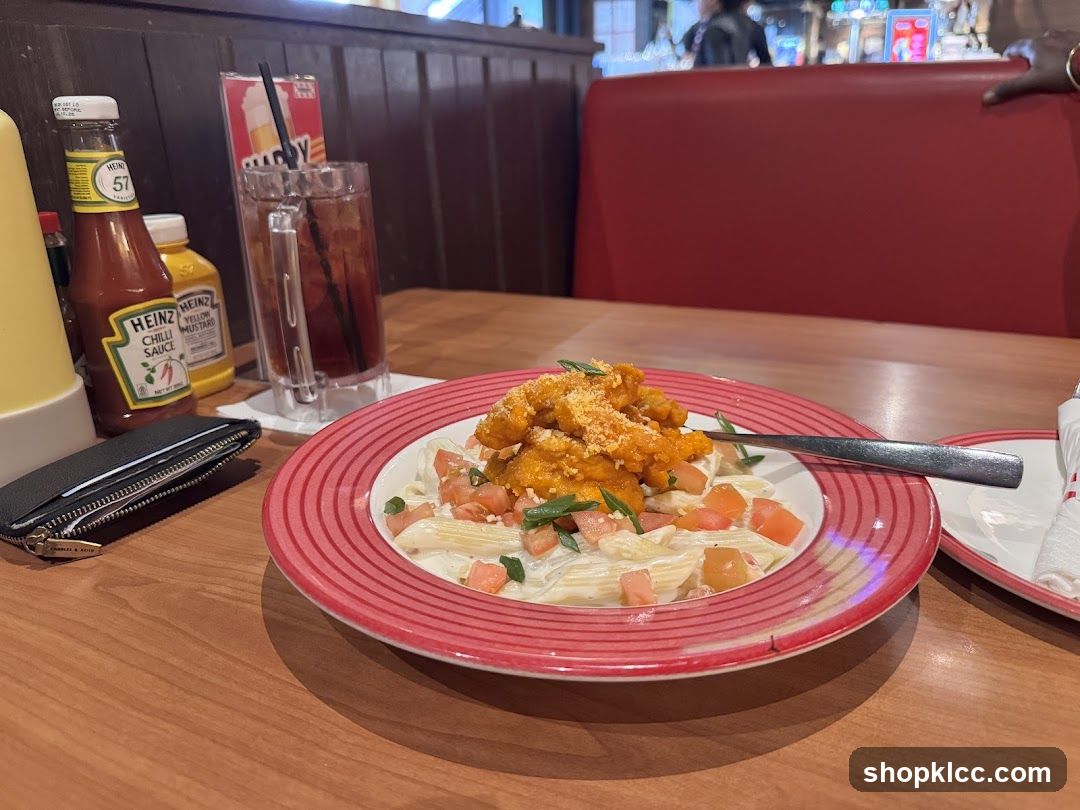 Pasta Dish with Chicken and Drink