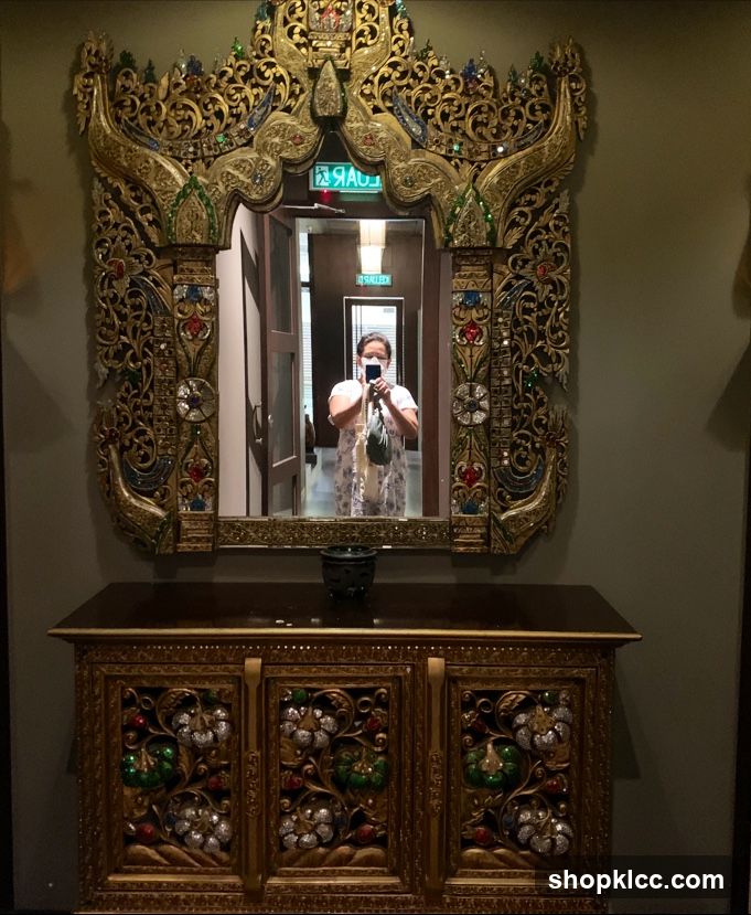 Ornate Mirror and Cabinet