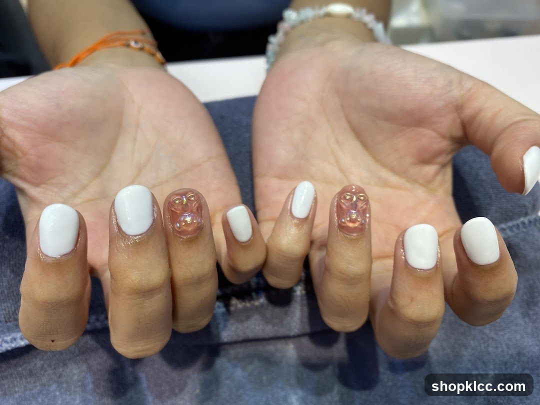 White Nails with Embellishments