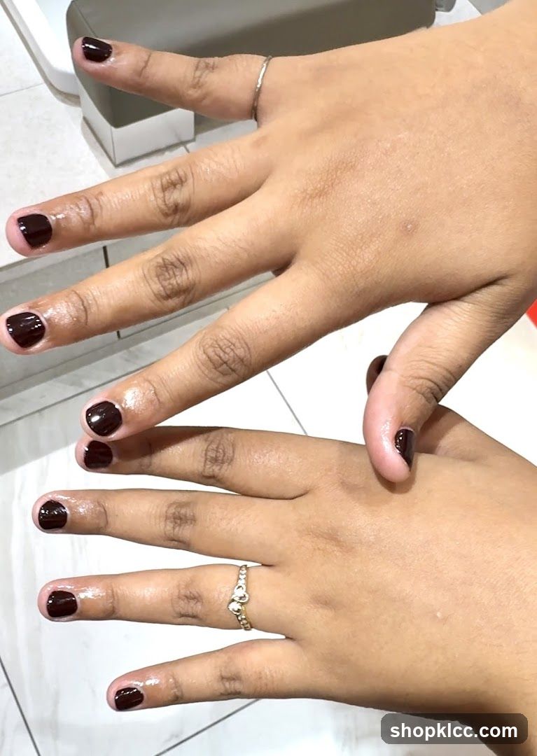 Hands with Dark Red Nail Polish